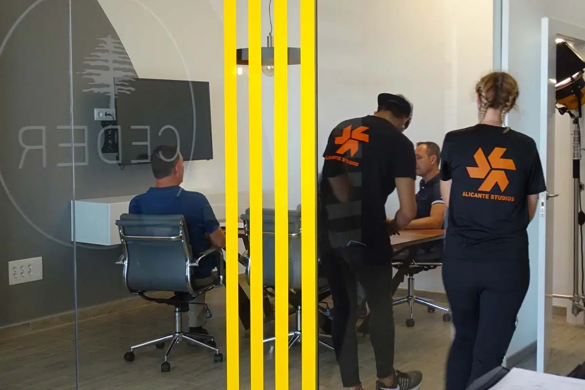 Alicante Studios crew filming inside a business