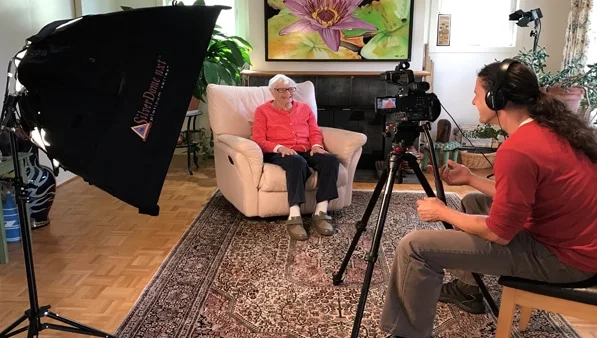 A Loving Legacy interview being filmed in a living room